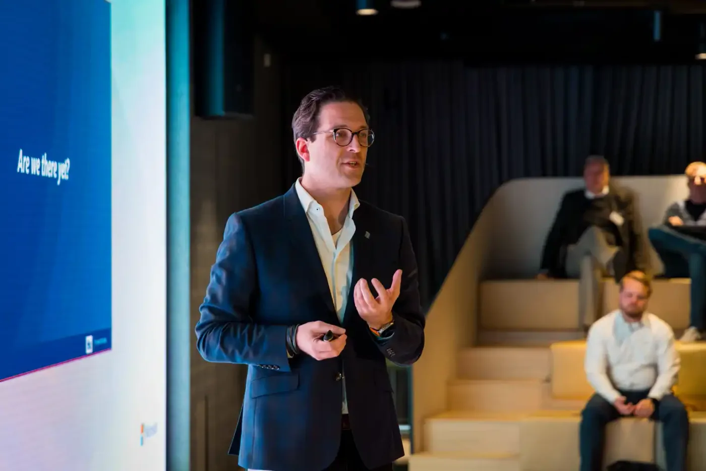Speaker presenting to attendees